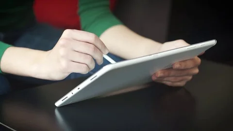 Woman Using Tablet With Smart Pen Stock Footage 73887101