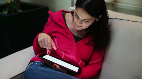 Woman using tablet on the sofa  Stock-Footage 36641908