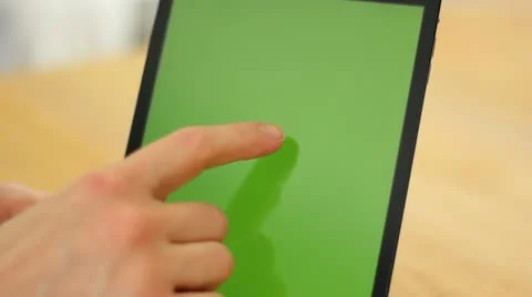 Woman Using Tablet on Wood Table Tap, Pinch Zoom &amp; Swipe - Close Up-Green Screen Stock Footage 22222404