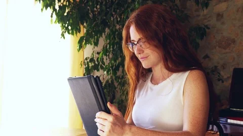 Woman using technology touchscreen glasses tablet pc ipad hipster Stock Footage 77769220