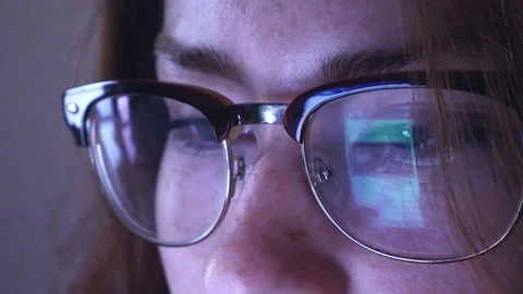 Woman using technology touchscreen glasses reflection slow motion close up eyes Stock Footage 77838717