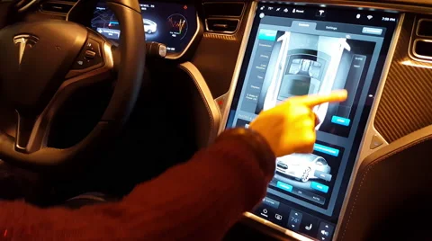 Woman using touch screen of a Tesla electric car 4K 스톡 동영상 57112484