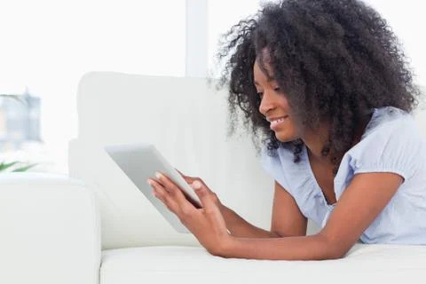 Woman using a touchpad Фото