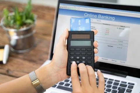 Woman Using Two Factor Authenticating For Bank Transfer Stock Photos