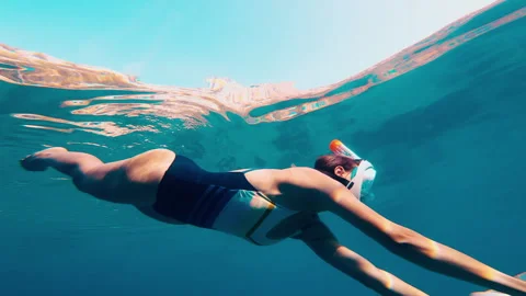 Woman using underwater scooter for diving. Modern sea scooter, modern technology Stock Footage 268622603