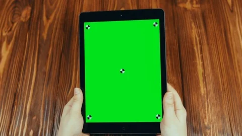 Woman Using Vertical Tablet With Green Screen Vídeo Stock 72453863