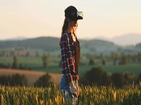 Woman Using Virtual Reality Glasses Outdoors. SLOW MOTION 4K. Stock Footage
