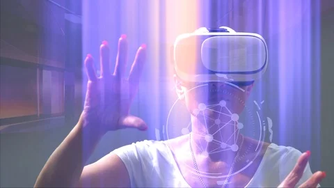 Woman using virtual reality glasses with graphics effects 스톡 동영상 91120164