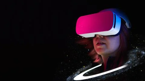 Woman is using virtual reality headset. Elements of this image furnished by NASA Stock Photos
