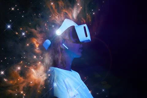 Woman is using virtual reality headset. Elements of this image furnished by NASA Stock Photos