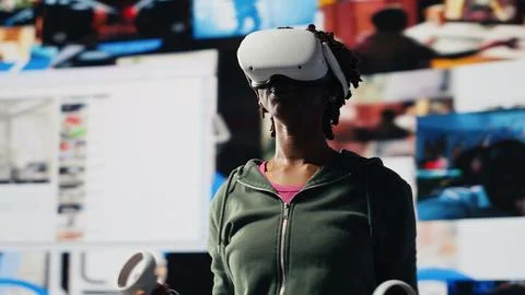 Woman using virtual reality tech to get access to video recommendations Stock Photos