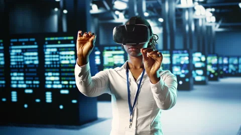 Woman using VR in data center Stock Footage 249563361