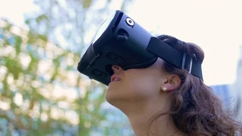 Woman Using VR Goggles Outside Closeup 스톡 동영상 76250833