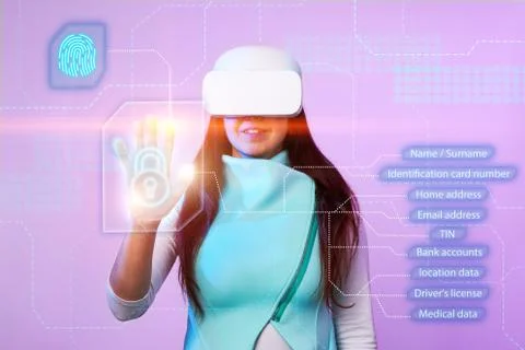 Woman is using vr headset to access for personal data. Foto stock