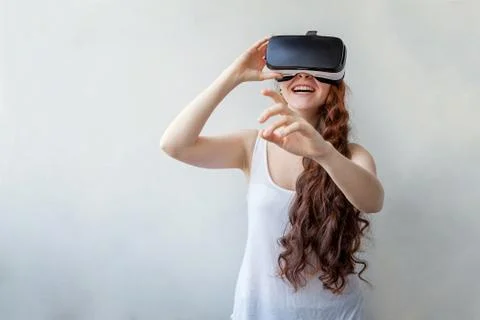 Woman using VR headset Stock Photos