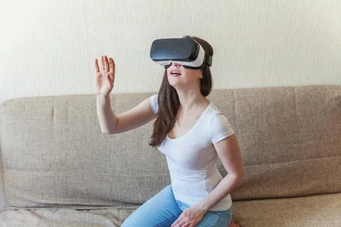 Woman using VR headset Stock Photos