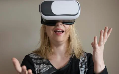 Woman using VR headset Stock Photos