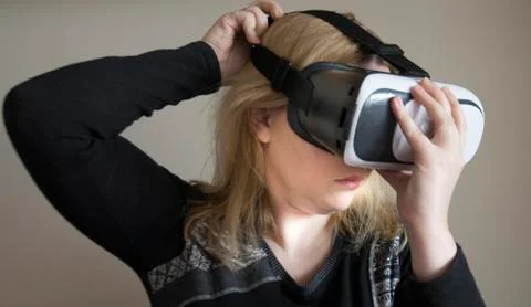 Woman using VR headset Stock Photos