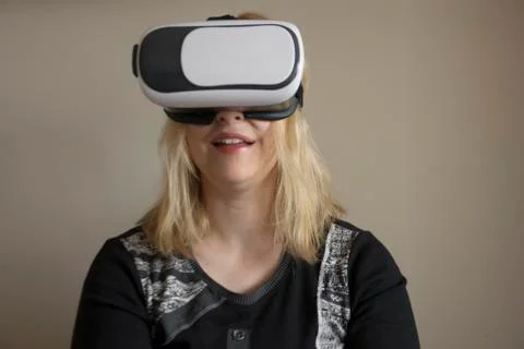 Woman using VR headset Stock Photos