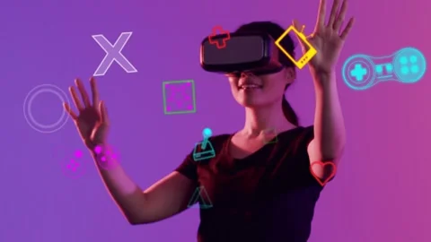 Woman using VR raising hands, moving neon gaming icons aligning on visor showing Stock Footage 335465492