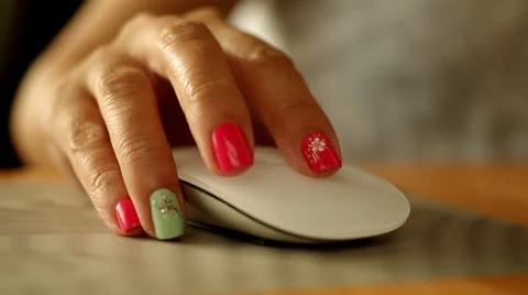 Woman using a wireless computer mouse Stock Footage 30368396