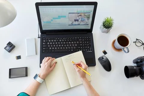 Woman with video editor program on computer Stock Photos