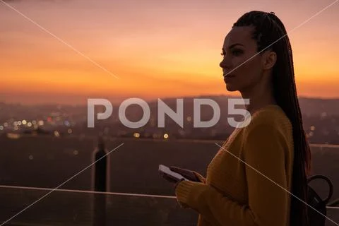 Woman viewing panorama of a modern city Stock Photos