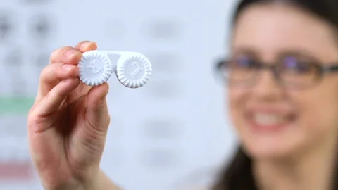Woman with vision problems recommending contact lens, eyesight support, health Stock Footage 110697447