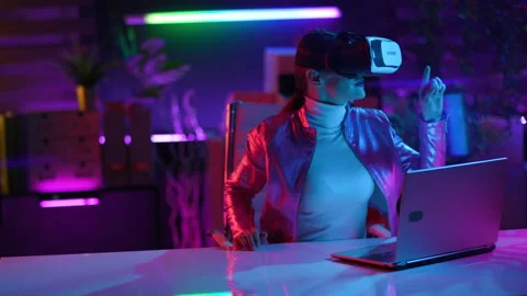 Woman in vr headset exploring digital cyber world in office Stock Footage 230519648