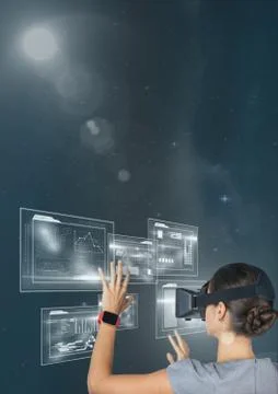 Woman in VR headset touching interface against blue sky with stars and flares Stock Photos