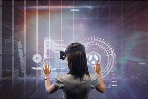 Woman in VR headset touching interface against galaxy and city background Foto stock