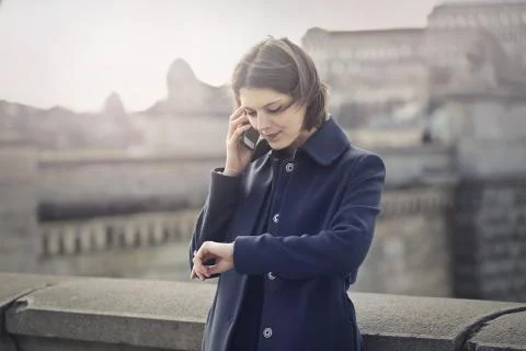 Woman waiting on rooftop Stock Photos