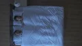 The woman wake a snore man in the bed. night time. view from above 4k or 4k+ Resolution