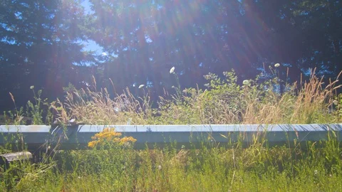 Woman Walking Back and Forth on a Metal Beam Stock Footage 91739306