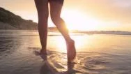 Woman Walking On Beach Barefoot Sunset Steadicam Shot Stock Footage