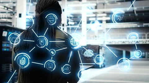 Woman walking in data center, using laptop to do maintenance, AI overlay Stock Footage 333166936