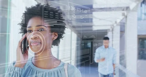 Woman walking down corridor while handling business call on phone, initiating Stock Footage 333968521