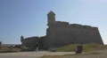 Woman walking near the Fort of São Francisco Xavier, Porto 4k or 4k+ Resolution