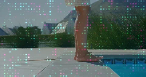 Woman walking pool deck, near edge, crouching to test water, animated ripple Stock Footage 333967853