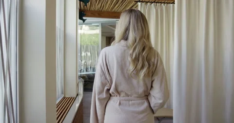 Woman Walking Through Spa In Robe 库存影片 141908756