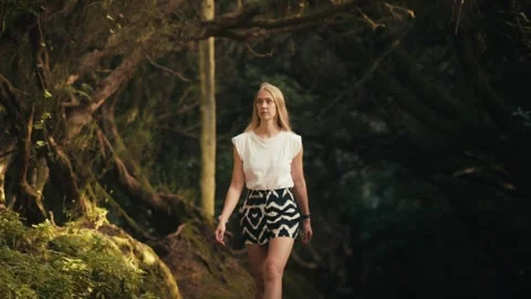 Woman Walking Toward Camera Through Sendero de los Sentidos, Anaga Rural Park Stock Footage 346167810