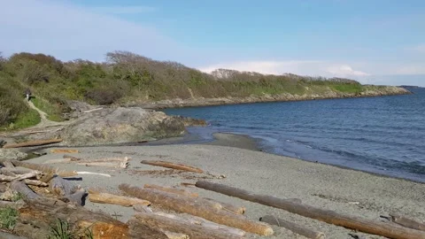 Woman walking trail to exit Willow's Beach Stock Footage 190826330