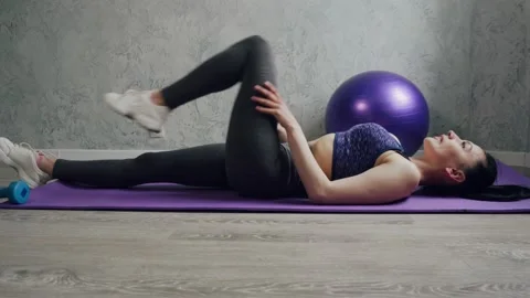 A woman is warming up before training. Stock Footage 130604914