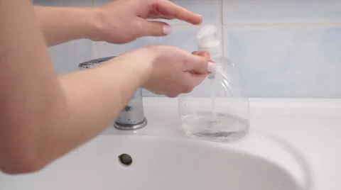 Woman washing hands under flowing tap wa... | Stock Video | Pond5