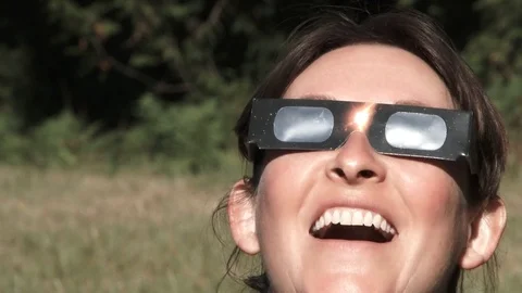 Woman Watching Solar Eclipse Stock Footage 79223781