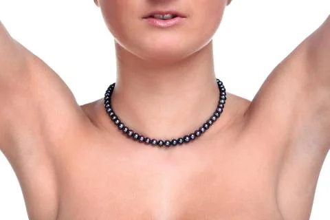 Woman wearing a black pearl necklace Stock Photos