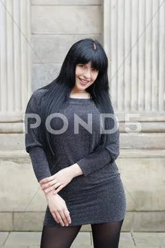Woman wearing mini dress Stock Photos
