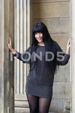 Woman wearing mini dress Stock Photos