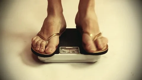 Woman on a weight. 스톡 동영상 73103941