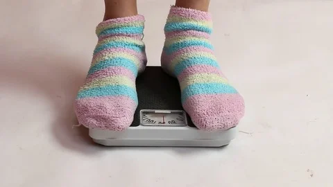 Woman on a weight. 스톡 동영상 73104019